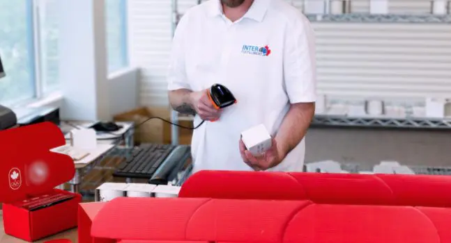 InterFulfillment best 3PL in canada warehouse team fulfilling official orders to equip Team Canada athletes.